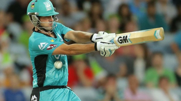 Feeling the pain: Joe Burns is whacked in the chest in the game against Sydney Thunder.