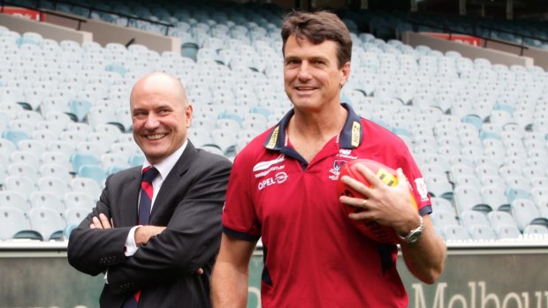 Paul Roos (right) is announced as Melbourne Football Club new coach, pictured with  with Demons' CEO Peter Jackson in 2013.