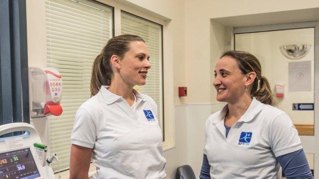 Medical registrar Louise Ward (left) with Dr Bethan Richards at RPA. Dr Richards is running a program to improve the well-being of junior doctors. 