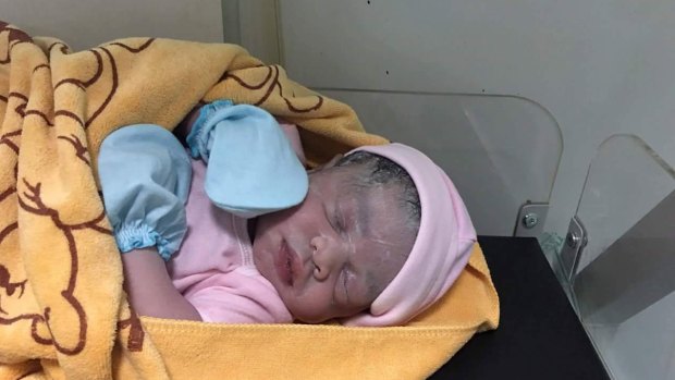 Cambodian Lux Clinic posted a photo of a minutes-old baby girl on Facebook following Hour Vanny's ceasarean on August 25. The surrogate mother confirmed the girl was the baby she carried.