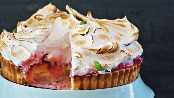 Lemon and raspberry-cardamom pie topped with wispy clouds of torched Italian meringue.