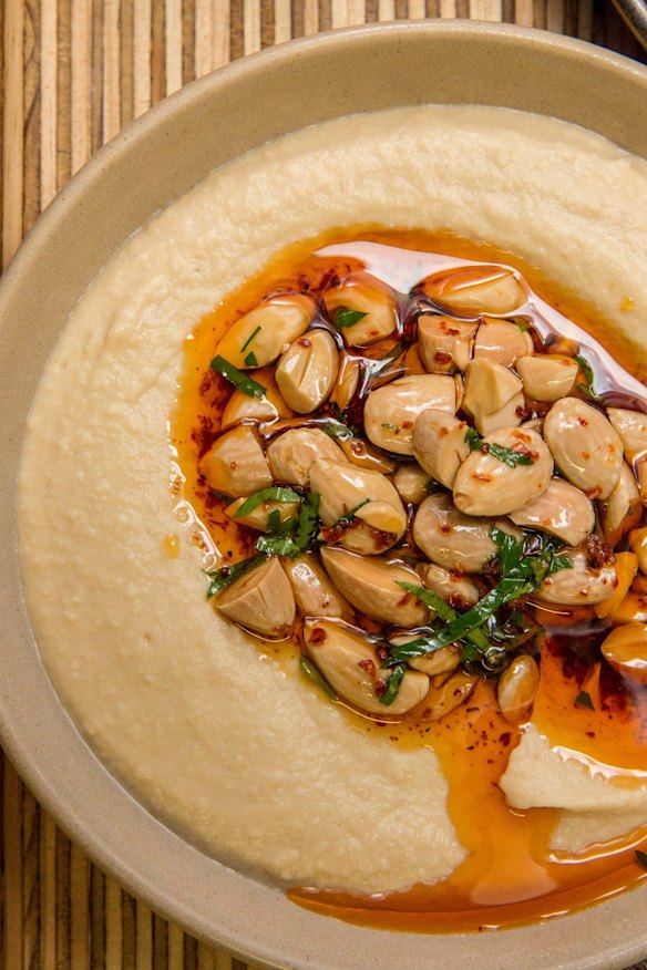 Smoked hummus, chickpeas, almonds and parsley. 