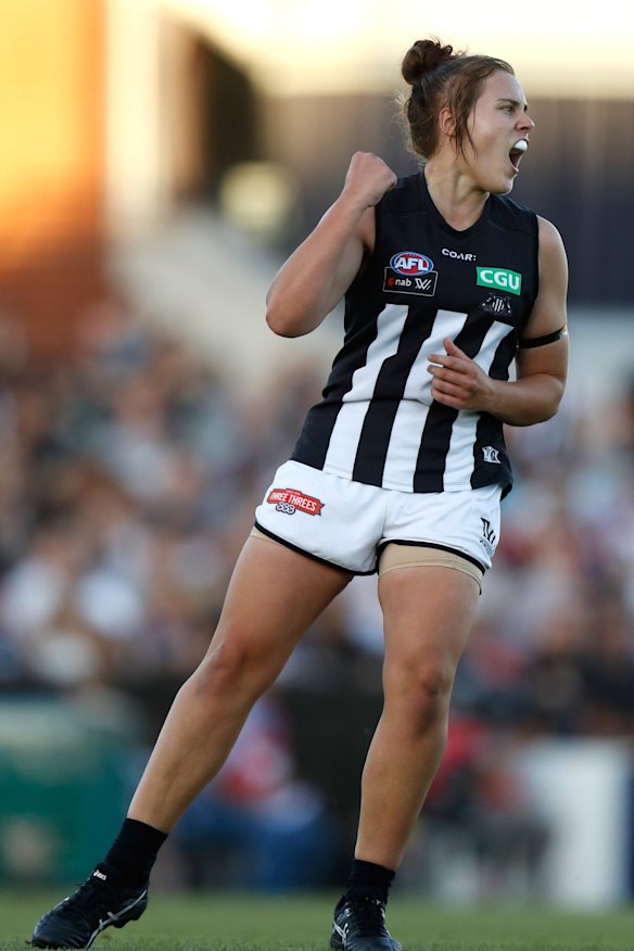 Collingwood's Jasmine Garner celebrates kicking a goal, the first of the match and her team's only major score for the night.