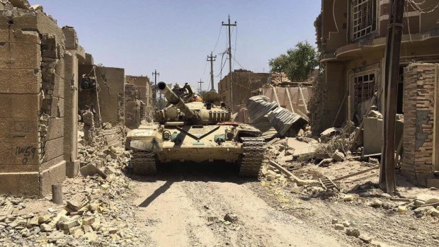 Iraqi security forces in Fallujah on June 26 after defeating Islamic State militants. 