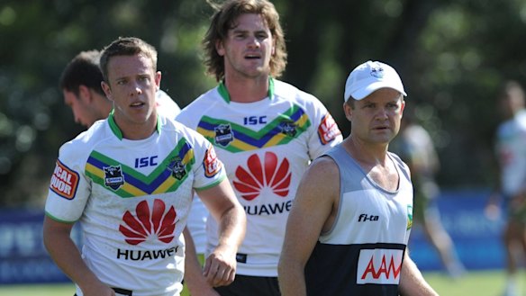 Still in the game: Chris James referees an opposed session at Raiders training.