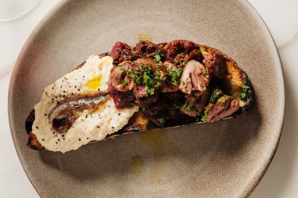 Devilled hearts and livers, and egg and anchovy on toast.