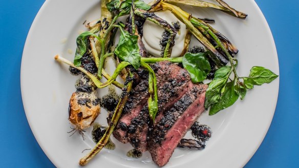 Flat-iron steak, beach greens and burnt leek.