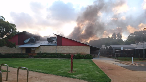 Police were looking for a group of teenagers following a fire at Melville Primary School on Friday night.