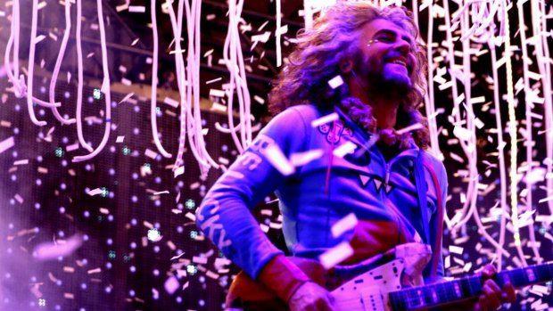 Wayne Coyne, The Flaming Lips frontman, performs at the free outdoor concert in the Domain. 