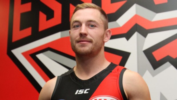In the red and black: New Essendon player Devon Smith.