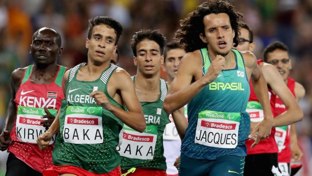 Abdellatif Baka of Algeria and Yeltsin Jacques of Brazil lead the pack in the men's 1500m T13 final at Olympic Stadium.