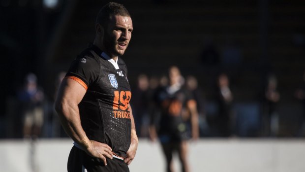 Caught in the middle: Robbie Farah playing NSW Cup against the Newtown Jets.