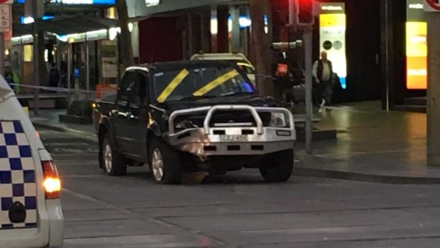 The car at the corner of Bourke and Swanston streets after the crash.