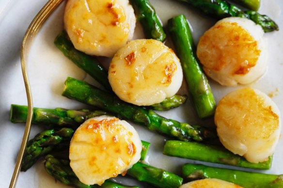 Adam Liaw's scallops and asparagus in silver sauce.