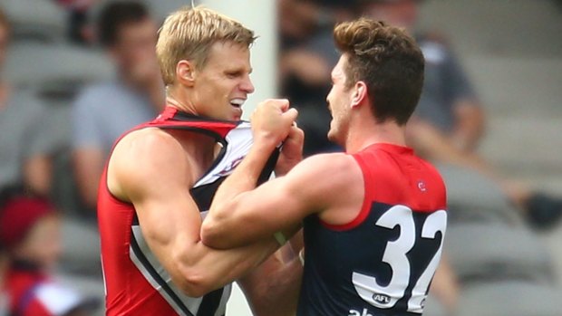 Fighting fit:  Nick Riewoldt tussles with Melbourne's Tomas Bugg during their NAB Challenge match.