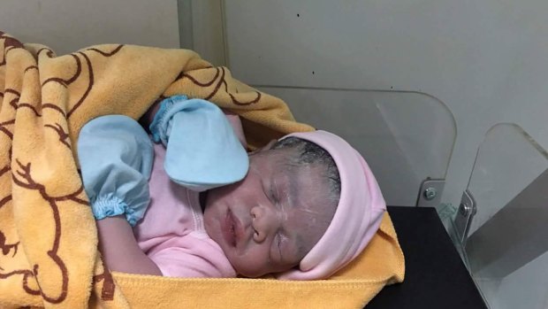 Cambodian Lux Clinic posted a photo of a minutes-old baby girl on Facebook following Hour Vanny's cesarean section on August 25. The surrogate mother confirmed the girl was the baby she carried.