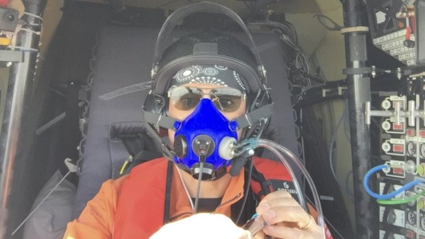 Swiss pilot Bertrand Piccard takes a selfie in his solar-powered plane's cockpit. 