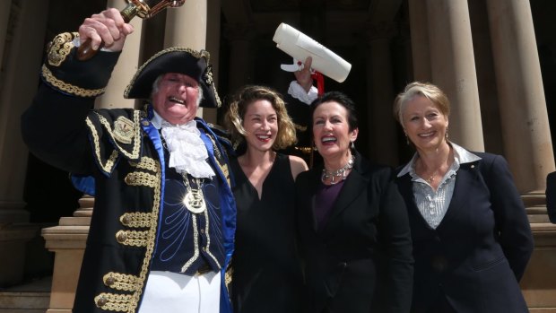 In better days: Town crier Graham Keating, Jess Miller, Sydney Lord Mayor Clover Moore and Professor Kerryn Phelps on the steps of Town Hall at the proclamation of the 2016 council.