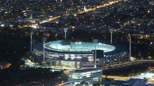 One man died and two people are in hospital after collapsing at the MCG on Saturday night.