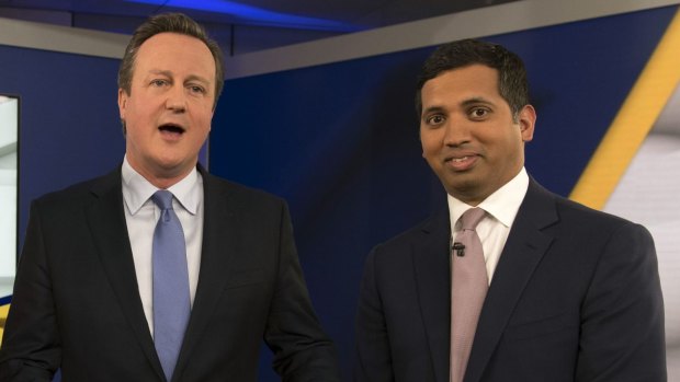 Prime Minister David Cameron poses for a photograph with Faisal Islam.