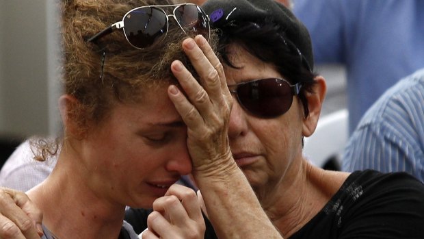 Hadar Goldin's fiancee mourns during his funeral in Kfar Saba, near Tel Aviv on August 3.