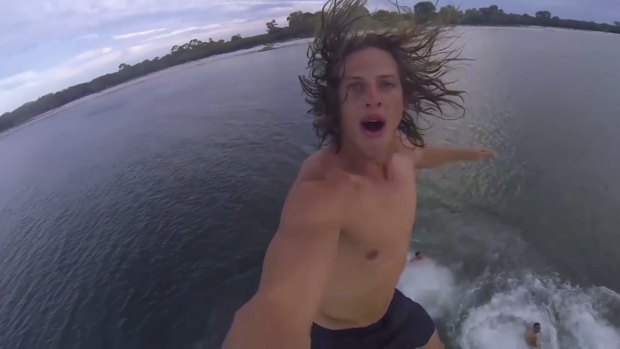 Nat Fyfe takes a leap off a luxury yacht.