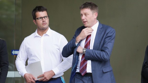 Gable Tostee leaves the court on Thursday with his lawyer Nick Dore.
