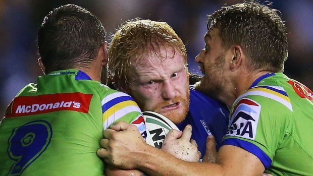 Bulldogs skipper James Graham takes the ball up in an un-PC manner.