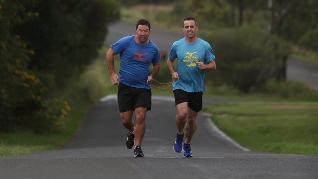 The duo run with a tether which helps the visually-impaired Nathan Johnston.