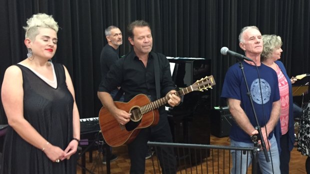 Musicians including Katie Noonan and Troy Cassar-Daly prepare for the benefit concert for Brisbane singer-songwriter Carol Lloyd at QPAC.