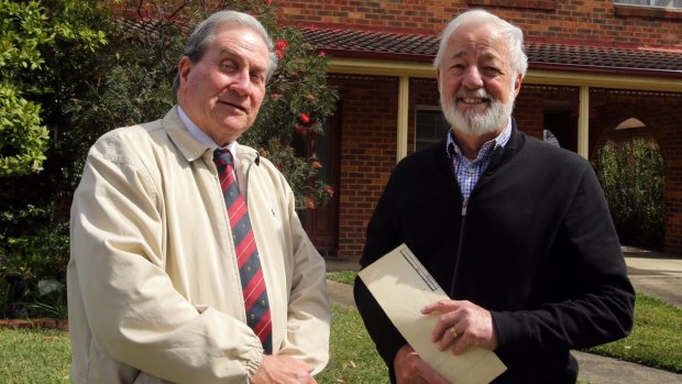 Ian McCormack (left) and Bruce Langley say the government's rush to privatise Land, Property and Information caused the massive error.