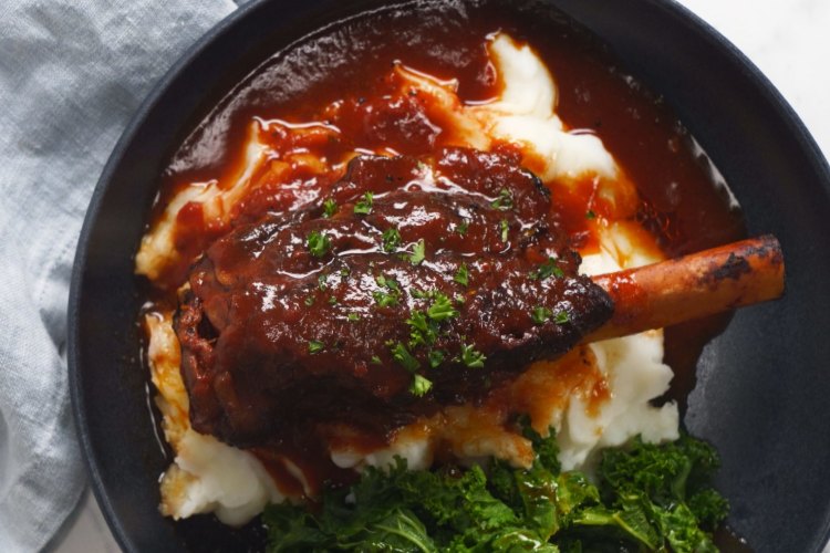 Lamb shanks in red wine sauce.