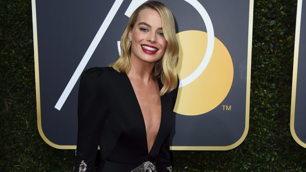 Margot Robbie arrives at the 75th annual Golden Globe Awards.