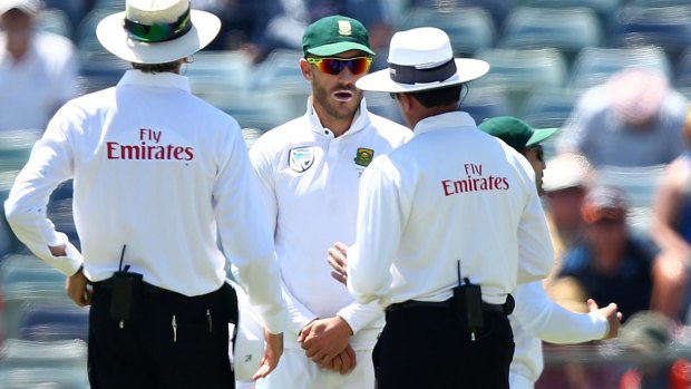 Umpires in discussion with Faf du Plessis during the first Test.