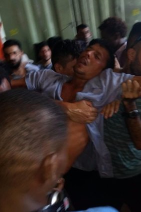 A photo from inside the Manus detention centre before its evacuation in November, showing one of  around 100 men who refused to leave.