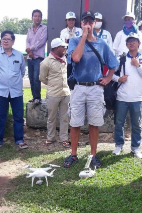 James Ricketson with a drone and its remote control device in a picture released by Cambodian police.