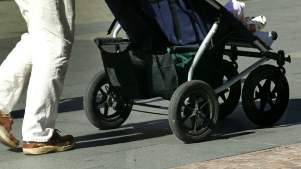 Police said there was a disturbance between a man and a woman and a pram was pushed into the path of an oncoming car.