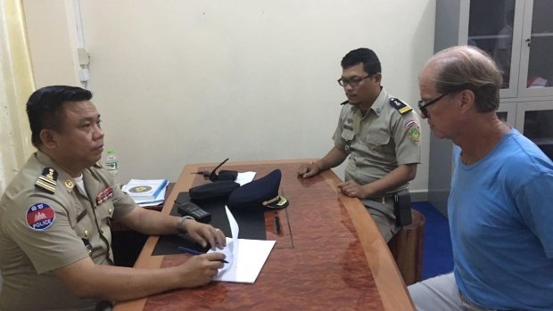 Australian filmmaker James Ricketson in police custody in Phnom Penh.
