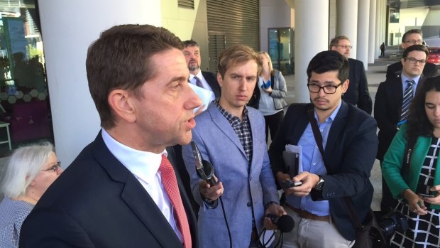 Health Minister Cameron Dick presents Lady Cilento Hospital finding.
