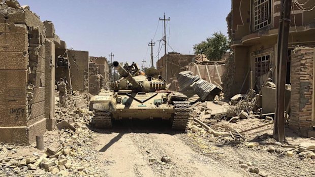 Iraqi security forces in Fallujah on June 26 after defeating Islamic State militants. 