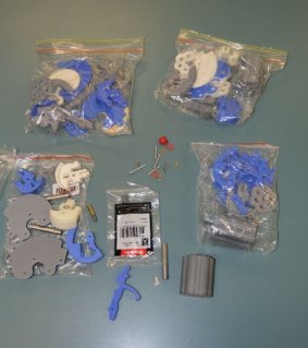 Drugs, a gun and 3D printed weapons were among the items seized when police raided a property near the Gold Coast.