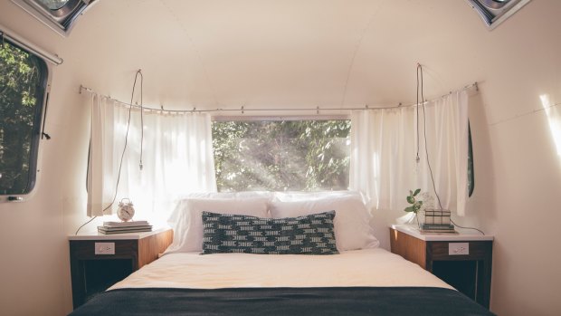 A bedroom inside an AirStream.
