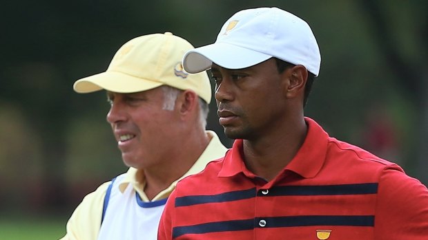 Caddie Steve Williams, left, with Tiger Woods.