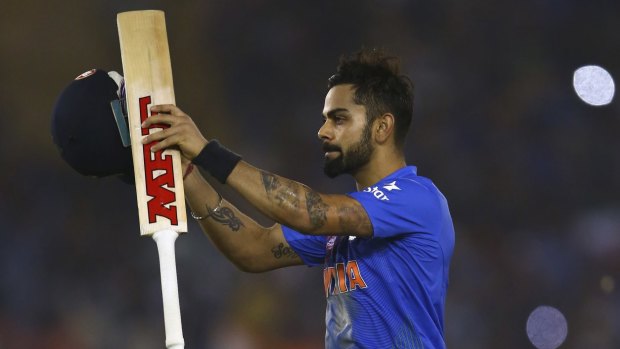 Virat Kohli celebrates victory over Australia on Sunday. 