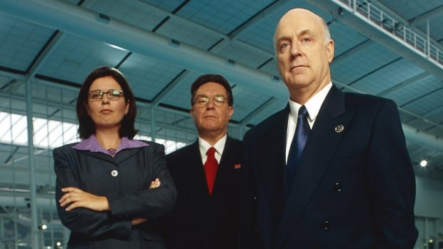 Gina Riley, Brian Dawe and John Clarke in the classic deadpan Aussie satire on the planning for the 2000 Sydney Olympics, <i>The Games</i>.