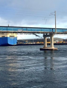 A ship hits the Fremantle Rail Bridge after a wild storm in Perth.