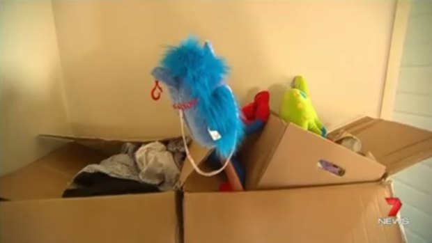 Boxes of donations made to the family after Roman's death were abandoned at the house.