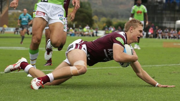 Outstanding debut: Tom Trbojevic scores for Manly in his first match in the NRL.