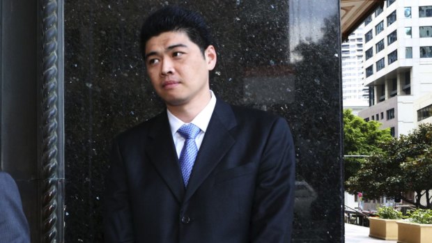 Narkena's business manager Perry Wu leaves the Downing Centre Local Court.