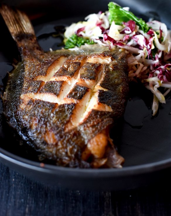 Baharat-marinated whole dory with chicory, kale and almond salad at Camus.